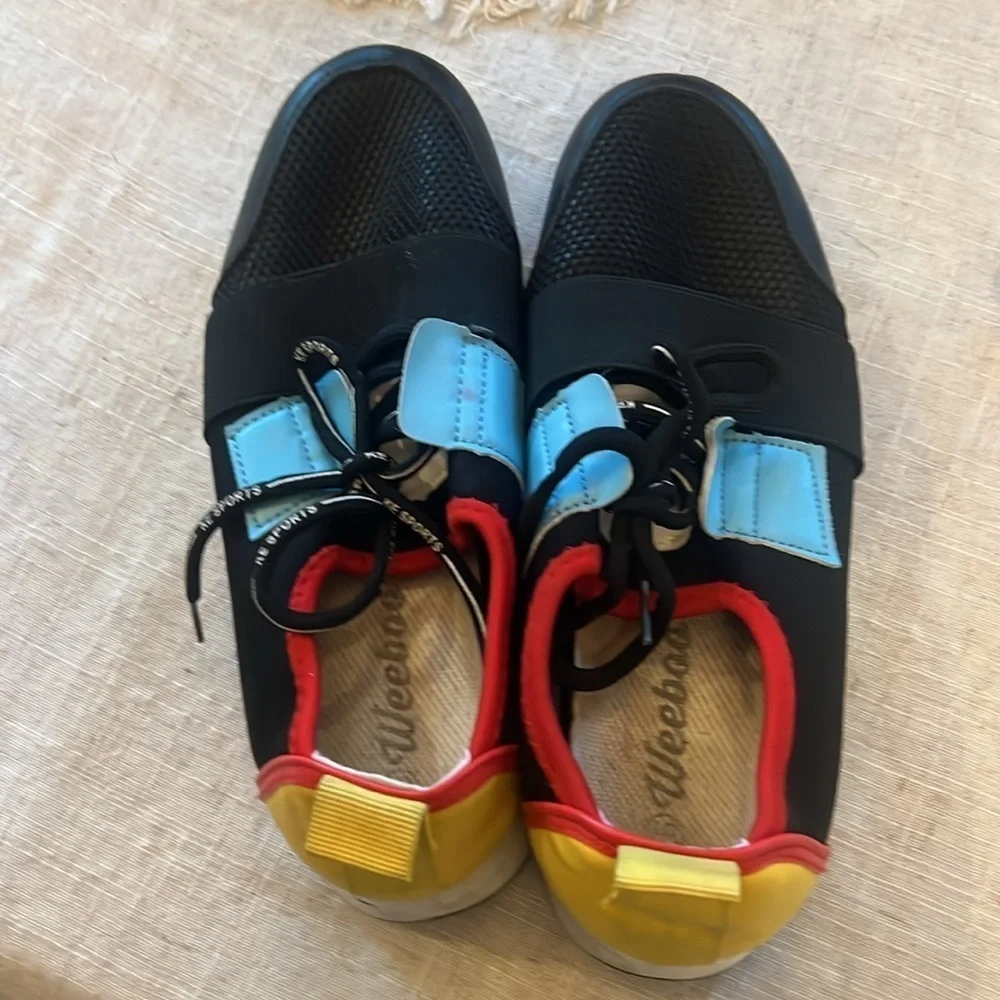 - Weeboo sneakers boys 7. Very good condition. Black blue red. Yellow water shoe